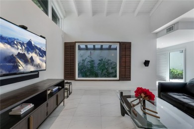 Modern Gables Oasis - this move-in ready home offers serenity on Riviera Country Club in Florida - for sale on GolfHomes.com, golf home, golf lot