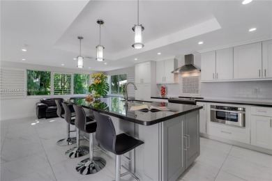 Modern Gables Oasis - this move-in ready home offers serenity on Riviera Country Club in Florida - for sale on GolfHomes.com, golf home, golf lot