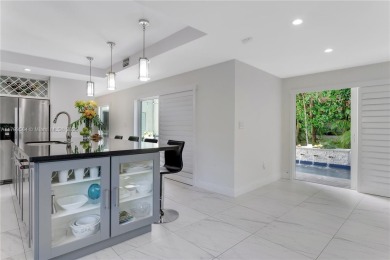 Modern Gables Oasis - this move-in ready home offers serenity on Riviera Country Club in Florida - for sale on GolfHomes.com, golf home, golf lot