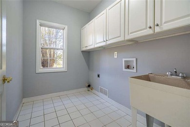 Ready to live your best life in the exclusive gated community of on Eagles Landing Country Club in Georgia - for sale on GolfHomes.com, golf home, golf lot