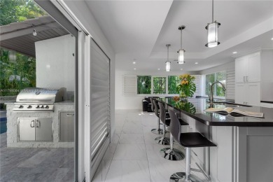 Modern Gables Oasis - this move-in ready home offers serenity on Riviera Country Club in Florida - for sale on GolfHomes.com, golf home, golf lot