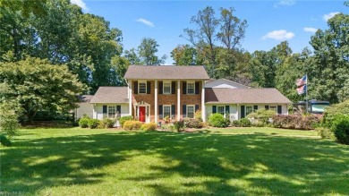 Tucked away on a quiet cul-de-sac in the prestigious Forest Oaks on Forest Oaks Country Club in North Carolina - for sale on GolfHomes.com, golf home, golf lot