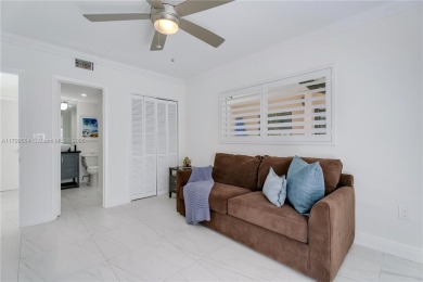 Modern Gables Oasis - this move-in ready home offers serenity on Riviera Country Club in Florida - for sale on GolfHomes.com, golf home, golf lot
