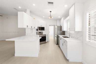 Welcome to this NEWLY UPDATED villa in the desirable Retreat at on Lost Lake Golf Club in Florida - for sale on GolfHomes.com, golf home, golf lot