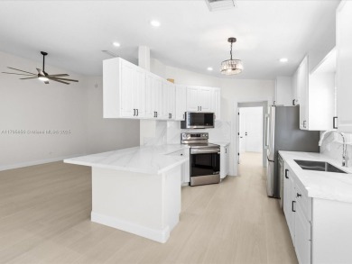 Welcome to this NEWLY UPDATED villa in the desirable Retreat at on Lost Lake Golf Club in Florida - for sale on GolfHomes.com, golf home, golf lot