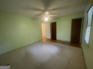 Check out this charming 3 bedroom, 1 bath bungalow in Decatur on East Lake Golf Club in Georgia - for sale on GolfHomes.com, golf home, golf lot