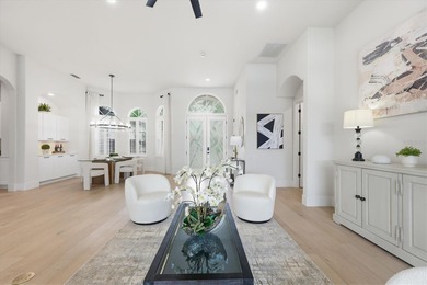 Welcome to an extraordinary, fully remodeled residence in the on University Park Country Club in Florida - for sale on GolfHomes.com, golf home, golf lot