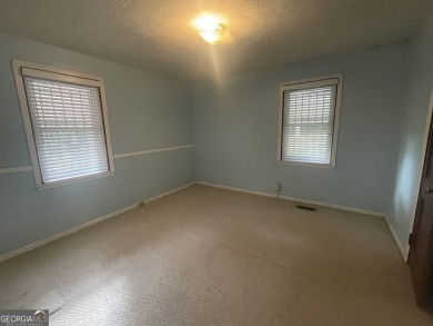 Check out this charming 3 bedroom, 1 bath bungalow in Decatur on East Lake Golf Club in Georgia - for sale on GolfHomes.com, golf home, golf lot