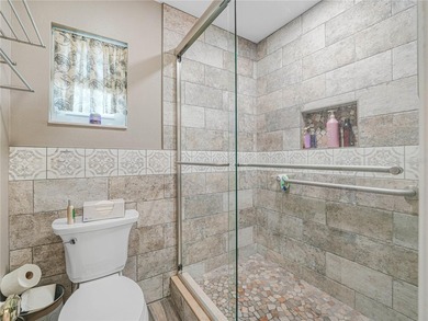 Discover the charm and elegance of this beautifully updated home on Sandpiper Golf Club in Florida - for sale on GolfHomes.com, golf home, golf lot