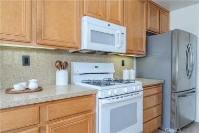 Welcome to this exquisite 2-bedroom, 2.5-bathroom townhome on Tustin Ranch Golf Club in California - for sale on GolfHomes.com, golf home, golf lot