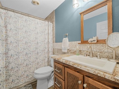 Discover the charm and elegance of this beautifully updated home on Sandpiper Golf Club in Florida - for sale on GolfHomes.com, golf home, golf lot