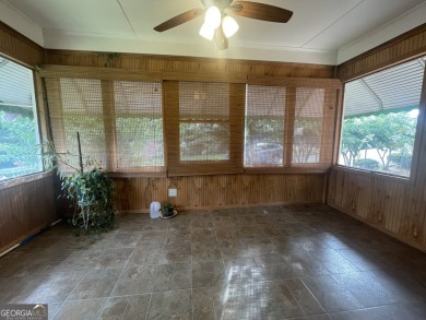 Check out this charming 3 bedroom, 1 bath bungalow in Decatur on East Lake Golf Club in Georgia - for sale on GolfHomes.com, golf home, golf lot