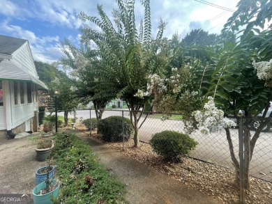 Check out this charming 3 bedroom, 1 bath bungalow in Decatur on East Lake Golf Club in Georgia - for sale on GolfHomes.com, golf home, golf lot