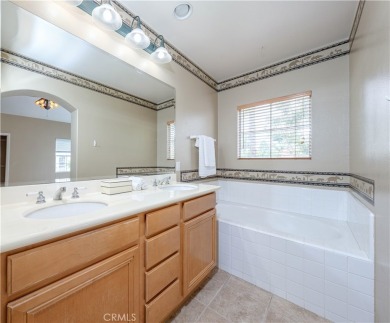 Welcome to this exquisite 2-bedroom, 2.5-bathroom townhome on Tustin Ranch Golf Club in California - for sale on GolfHomes.com, golf home, golf lot