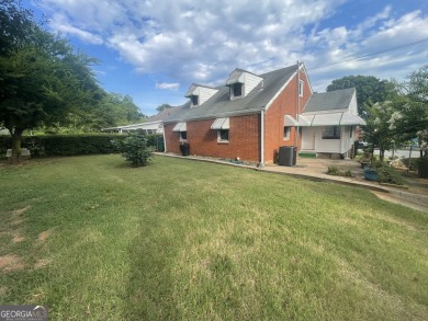 Check out this charming 3 bedroom, 1 bath bungalow in Decatur on East Lake Golf Club in Georgia - for sale on GolfHomes.com, golf home, golf lot