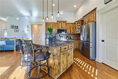 Welcome home to 707 Tomahawk Court! This immaculate, elevated on Paradise Pointe Golf Complex in Missouri - for sale on GolfHomes.com, golf home, golf lot