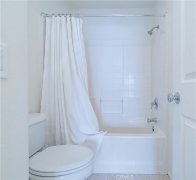 Welcome to this exquisite 2-bedroom, 2.5-bathroom townhome on Tustin Ranch Golf Club in California - for sale on GolfHomes.com, golf home, golf lot