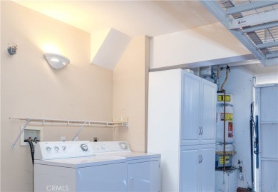Welcome to this exquisite 2-bedroom, 2.5-bathroom townhome on Tustin Ranch Golf Club in California - for sale on GolfHomes.com, golf home, golf lot