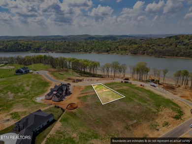A lake view lot at an unbeatable price! Discover the essence of on Tennessee National Golf Club in Tennessee - for sale on GolfHomes.com, golf home, golf lot