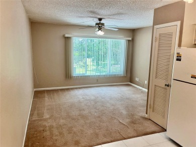 Step into the welcoming embrace of this charming 2 Bed/2 Bath on On Top Of The World Golf Course in Florida - for sale on GolfHomes.com, golf home, golf lot