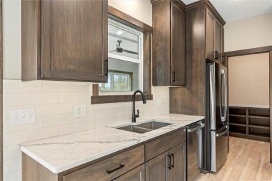 Discover this newly built 3-bedroom, 3-bath plus office home in on Crosswoods Golf Course - Crosswoods in Minnesota - for sale on GolfHomes.com, golf home, golf lot