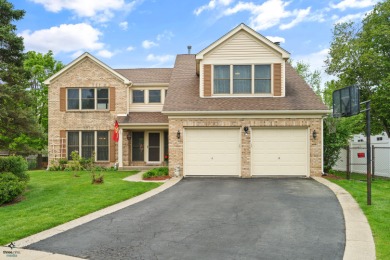 This 4-bed/2.5-bath home with Dual Staircases is located in the on Village Green Country Club in Illinois - for sale on GolfHomes.com, golf home, golf lot