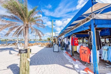 Gorgeous, remodeled two bedroom, 1.5 bathroom Perdido Key oasis on Perdido Bay Golf Club in Florida - for sale on GolfHomes.com, golf home, golf lot