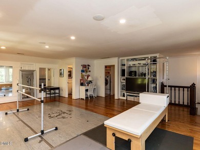 Introducing an exquisite home for sale in the desirable North on North Ridge Country Club in North Carolina - for sale on GolfHomes.com, golf home, golf lot