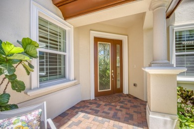 SPECTACULAR golf course views & maintenance-free luxury living on Jupiter Country Club in Florida - for sale on GolfHomes.com, golf home, golf lot