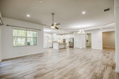 SPECTACULAR golf course views & maintenance-free luxury living on Jupiter Country Club in Florida - for sale on GolfHomes.com, golf home, golf lot