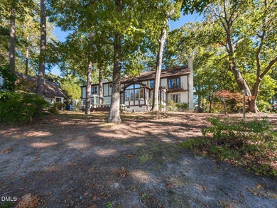 Introducing an exquisite home for sale in the desirable North on North Ridge Country Club in North Carolina - for sale on GolfHomes.com, golf home, golf lot