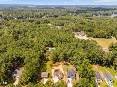 Gorgeous New Build With First Floor Owner's Suite  Office in the on River Golf and Country Club at Lake Royale in North Carolina - for sale on GolfHomes.com, golf home, golf lot
