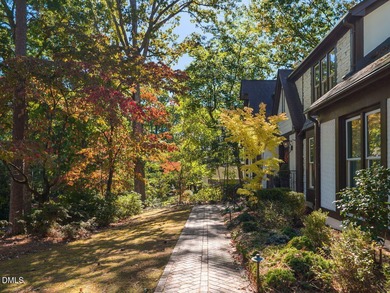 Introducing an exquisite home for sale in the desirable North on North Ridge Country Club in North Carolina - for sale on GolfHomes.com, golf home, golf lot