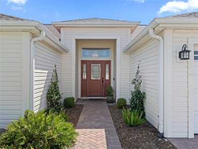 One or more photo(s) has been virtually staged. This inviting on Amberwood Executive Golf Course in Florida - for sale on GolfHomes.com, golf home, golf lot