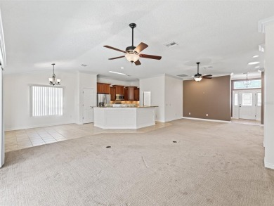 One or more photo(s) has been virtually staged. This inviting on Amberwood Executive Golf Course in Florida - for sale on GolfHomes.com, golf home, golf lot