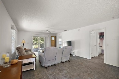 Welcome to this WATERFRONT 2/2 Marathon Courtyard Villa with a on The Links of Spruce Creek in Florida - for sale on GolfHomes.com, golf home, golf lot
