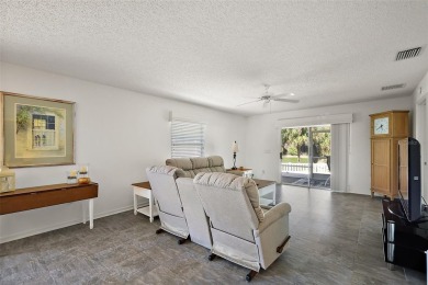 Welcome to this WATERFRONT 2/2 Marathon Courtyard Villa with a on The Links of Spruce Creek in Florida - for sale on GolfHomes.com, golf home, golf lot