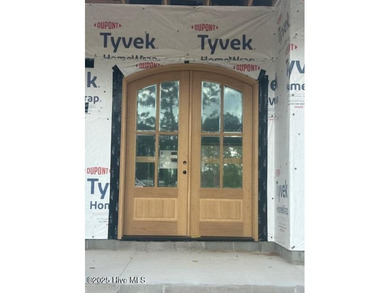 A gorgeous new home on the fairways of the prestigious Tiger's on Ocean Ridge Plantation in North Carolina - for sale on GolfHomes.com, golf home, golf lot