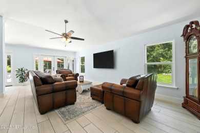 Completely Remodeled Pool Home located on a spacious .51 acre on Cimarrone Golf and Country Club in Florida - for sale on GolfHomes.com, golf home, golf lot