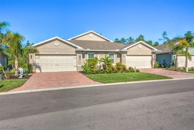 This coastal contemporary home with private preserve view will on Herons Glen Golf and Country Club in Florida - for sale on GolfHomes.com, golf home, golf lot