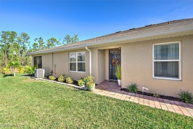 This coastal contemporary home with private preserve view will on Herons Glen Golf and Country Club in Florida - for sale on GolfHomes.com, golf home, golf lot