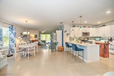 This coastal contemporary home with private preserve view will on Herons Glen Golf and Country Club in Florida - for sale on GolfHomes.com, golf home, golf lot