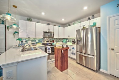 This coastal contemporary home with private preserve view will on Herons Glen Golf and Country Club in Florida - for sale on GolfHomes.com, golf home, golf lot