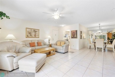 Lovely light and bright first floor corner unit overlooking the on Deer Creek Golf Club in Florida - for sale on GolfHomes.com, golf home, golf lot