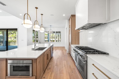 Welcome to 438 Regatta Bay Boulevard -- an exceptional new on Regatta Bay Golf and Country Club in Florida - for sale on GolfHomes.com, golf home, golf lot