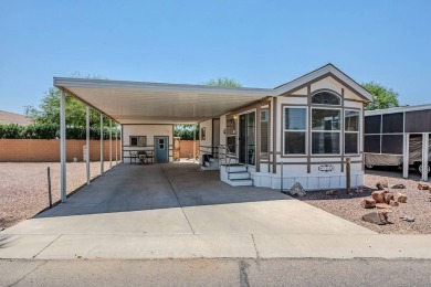 Welcome to your sunny desert retreat in the sought-after Palm on Palm Creek Golf and RV Resort in Arizona - for sale on GolfHomes.com, golf home, golf lot