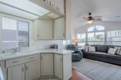 Welcome to your sunny desert retreat in the sought-after Palm on Palm Creek Golf and RV Resort in Arizona - for sale on GolfHomes.com, golf home, golf lot