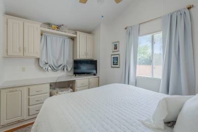 Welcome to your sunny desert retreat in the sought-after Palm on Palm Creek Golf and RV Resort in Arizona - for sale on GolfHomes.com, golf home, golf lot