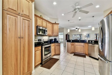 Beautiful and immaculately maintained Savoy model featuring a on Poinciana Golf Club in Florida - for sale on GolfHomes.com, golf home, golf lot