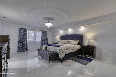 This extraordinary, designer-renovated 4-bedroom, 3-bath on Sugar Mill Country Club in Florida - for sale on GolfHomes.com, golf home, golf lot